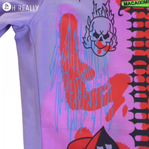 Pantalones holgados con impresiones dibujos y letras - Imagen 8