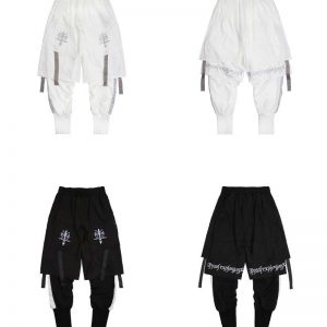 Pantalones multicapa con bordados - Imagen 9