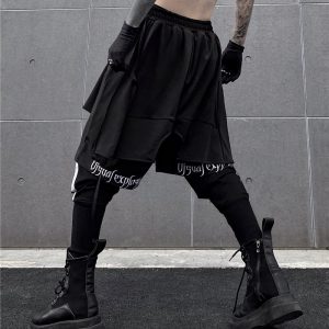 Pantalones multicapa con bordados - Imagen 10