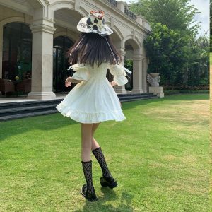 Vestido blanco con volantes - Imagen 6